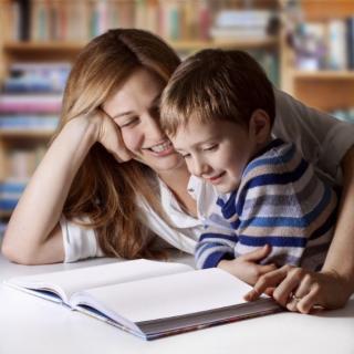 Image of parent and child reading book